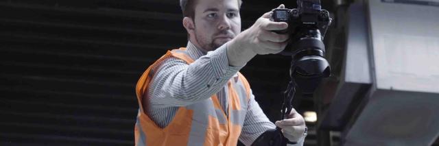Voordelen professionele fotograaf Professionele fotograaf in actie